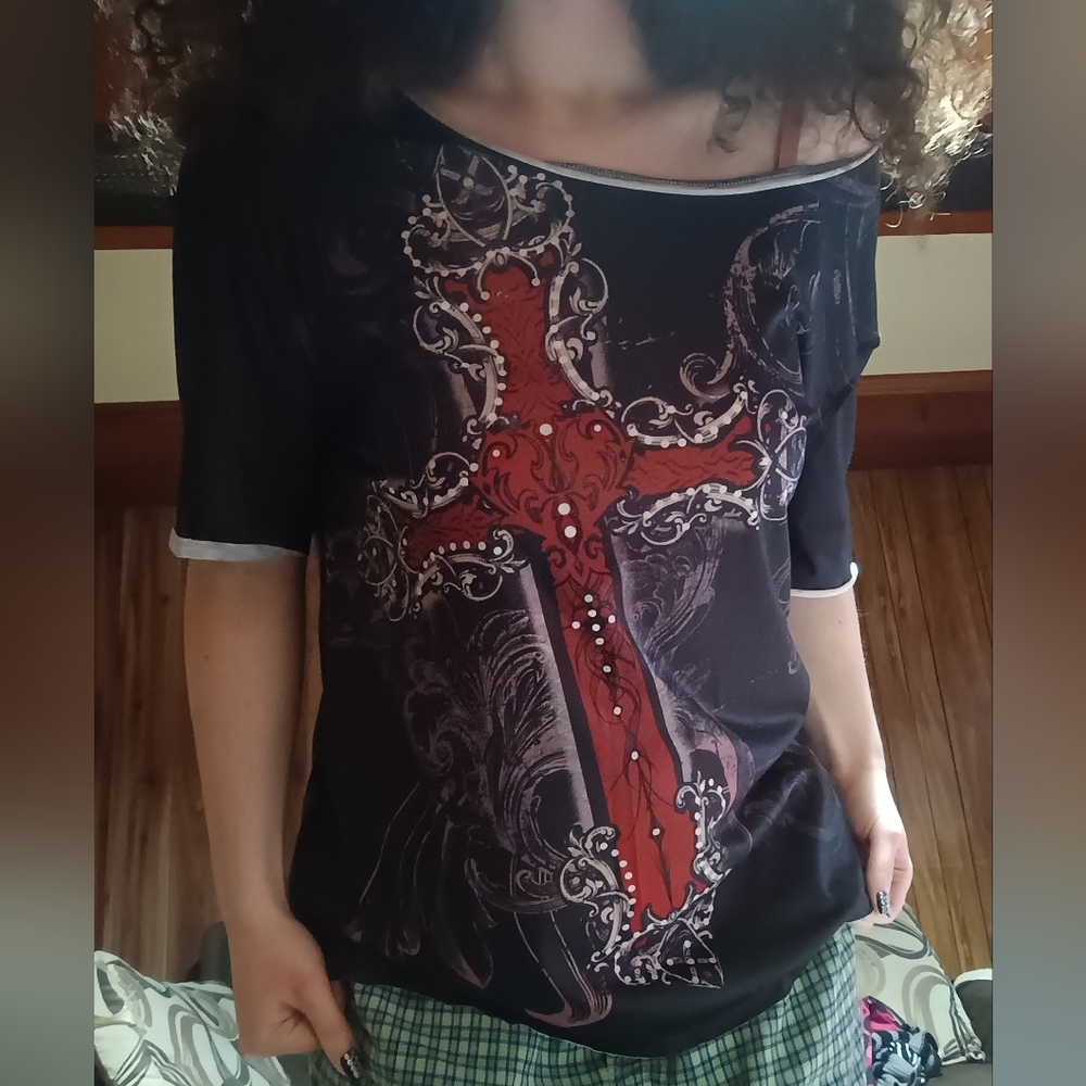 black top with big red cross